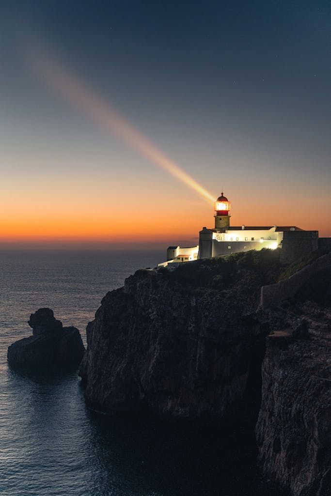 Stunning view of Cape St Vincent lighthouse at sunset in Algarve, Portugal.